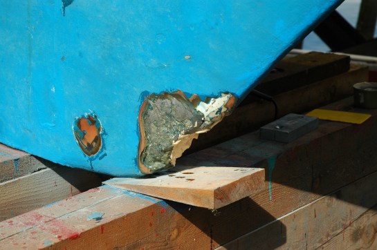 The bottom of Rainbird's keel was damaged when she hit a reef. After grinding the damaged back a previous repair was revealed. I used multiple layers of epoxy and micro-spheres to fill the damaged area then finished the job with a grinder and a coarse file.