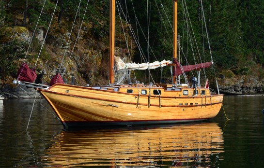 Beautiful strip-planked Wildwood, built on Vancouver Island, seen here in Maple Bay, on her way to the Victoria Classic Boat Festival.